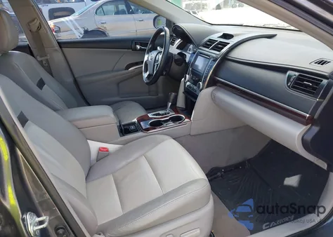 2012 Toyota Camry Xle z USA, uszkodzony, nr VIN 4T4BF1FK1CR253820